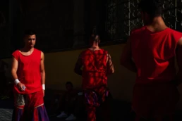 Calcio Storico Fiorentino: calcianti in red confront each other on the sand arena