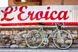 L'Eroica vintage cycling event sign with a heritage bicycle in Gaiole in Chianti
